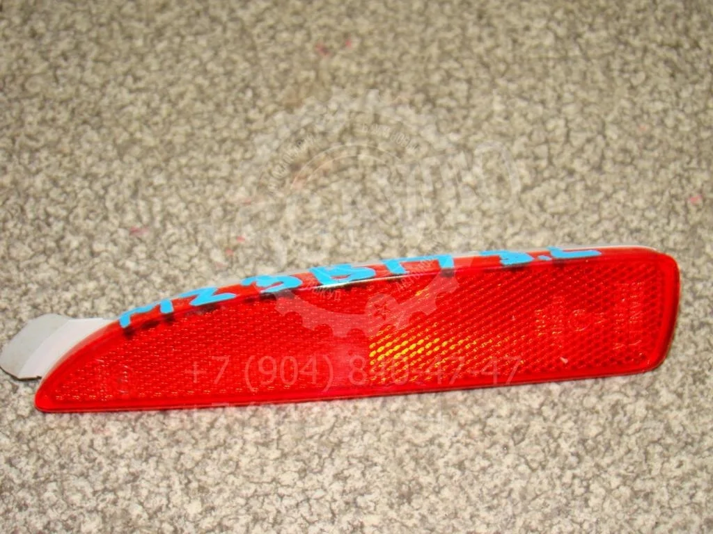 Отражатель в бампер задний левый Mazda 3 BM, BN