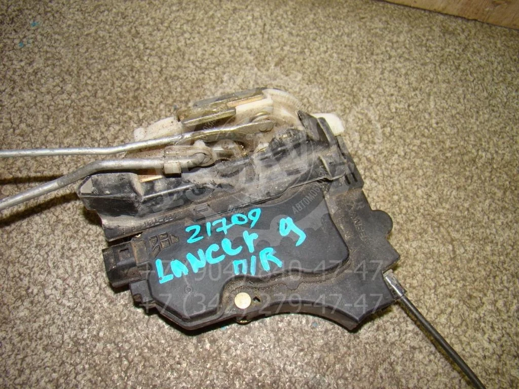 Замок двери передней правой Mitsubishi Lancer 9 CS