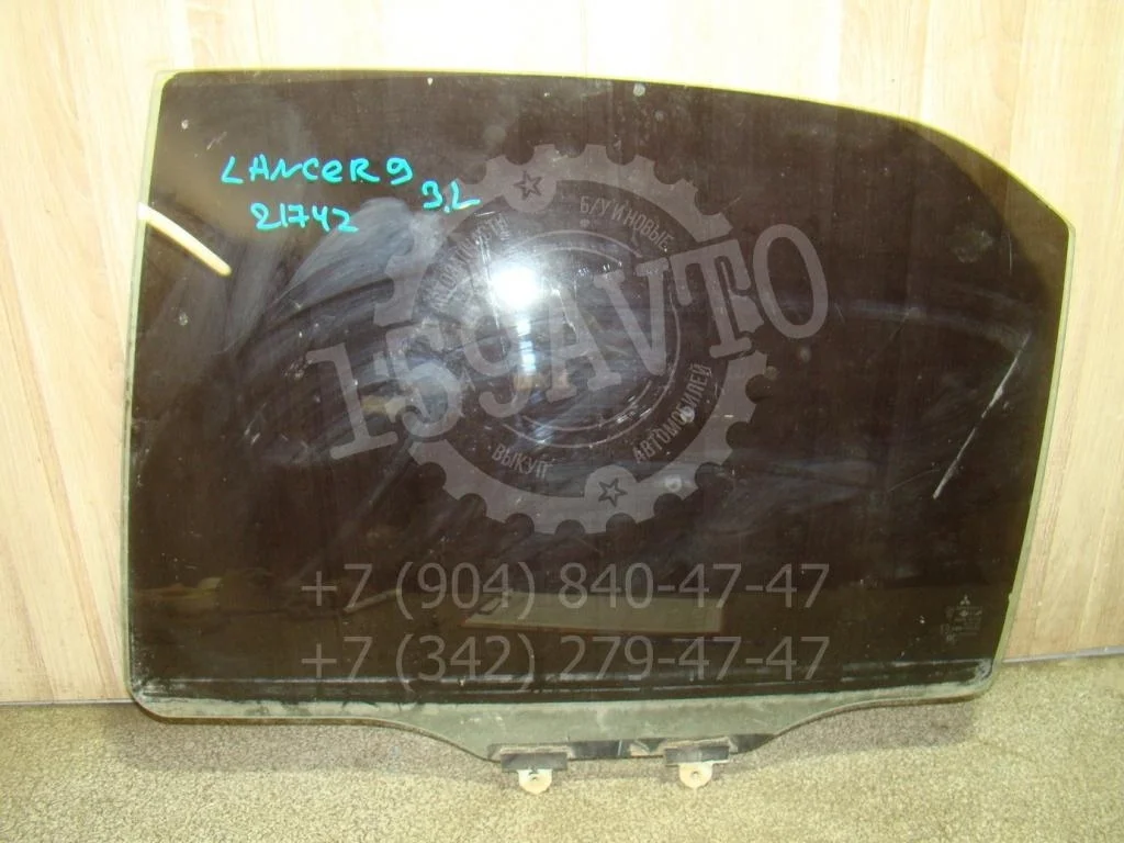 Стекло двери задней левой Mitsubishi Lancer 9 CS