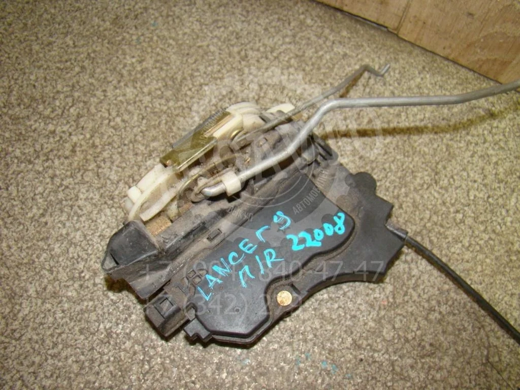 Замок двери передней правой Mitsubishi Lancer 9 CS