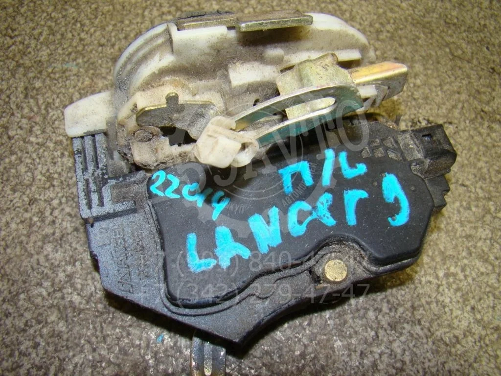 Замок двери передней левой Mitsubishi Lancer 9 CS