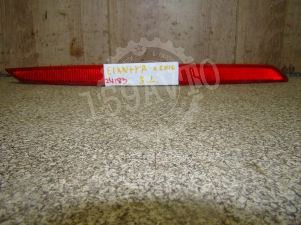 Отражатель в бампер задний левый Hyundai Elantra AD