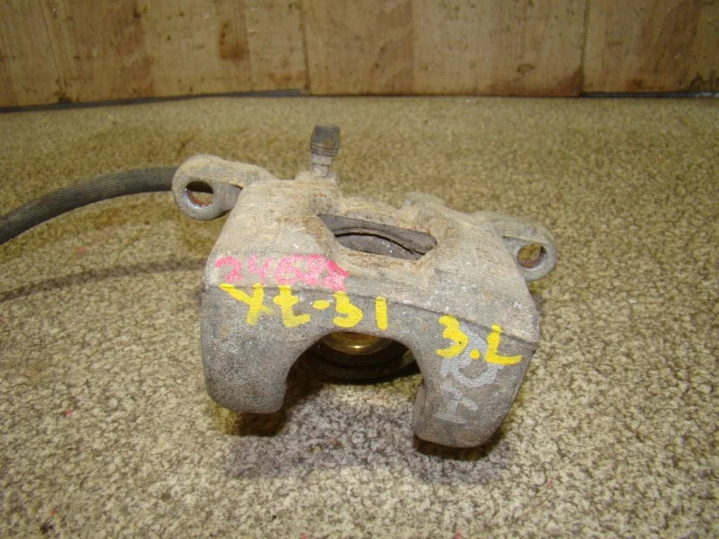 Суппорт задний левый Nissan X-Trail T31