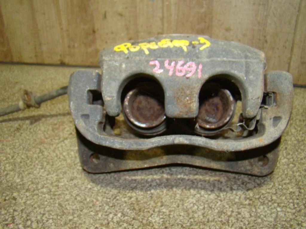 Суппорт передний левый Subaru Forester S12, SH