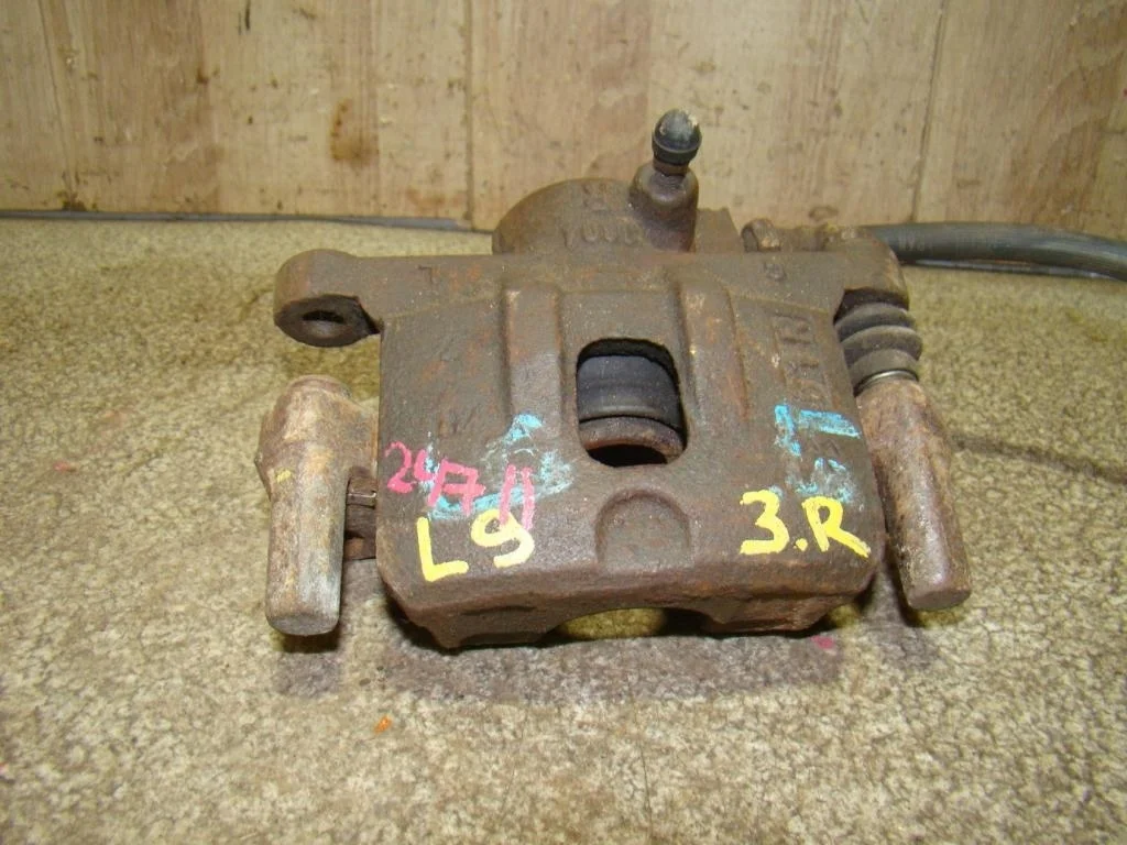 Суппорт задний правый Mitsubishi Lancer 9 CS