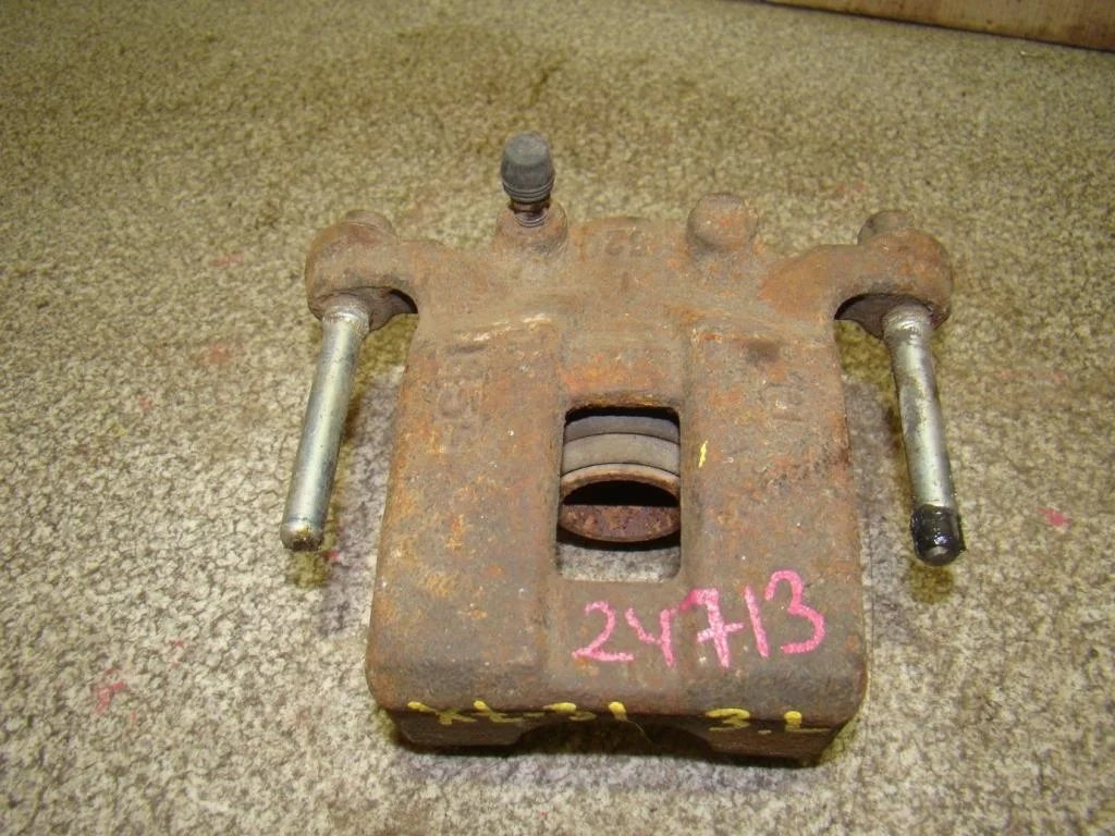 Суппорт задний левый Nissan X-Trail T31