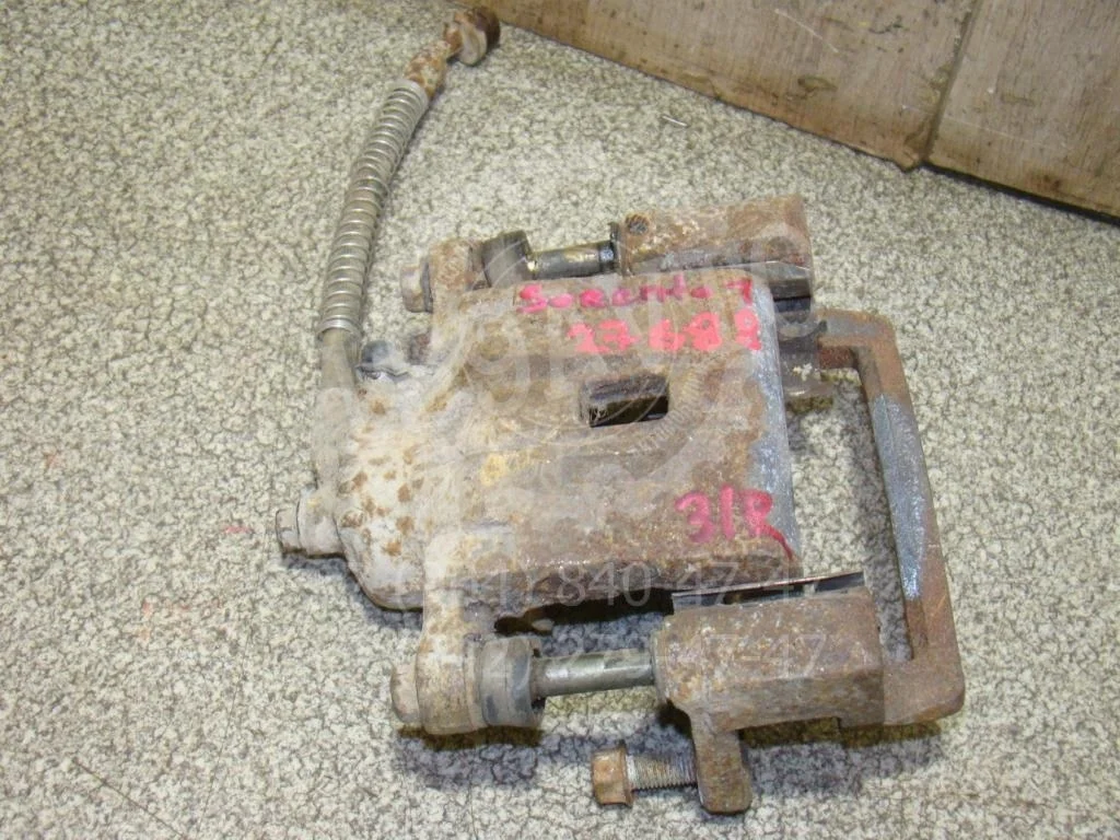 Суппорт задний левый Kia Sorento 1 BL