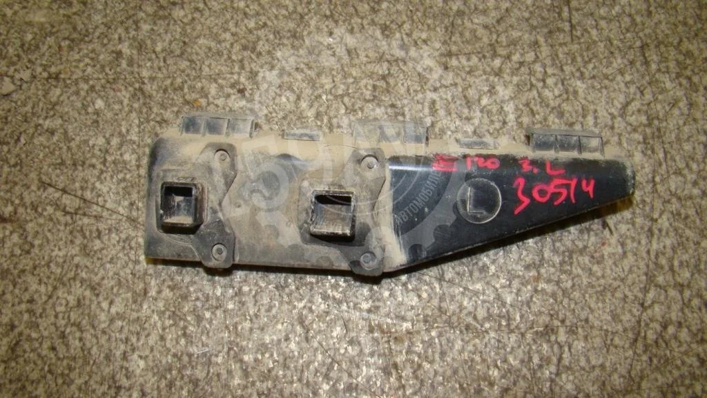 Кронштейн заднего бампера левый Toyota Corolla E120