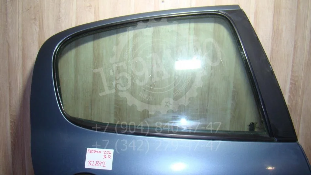 Стекло двери задней правой Peugeot 206