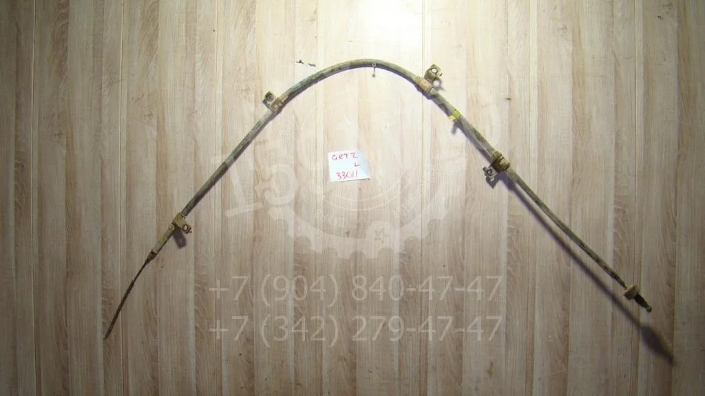 Трос ручника левый Hyundai Getz TB