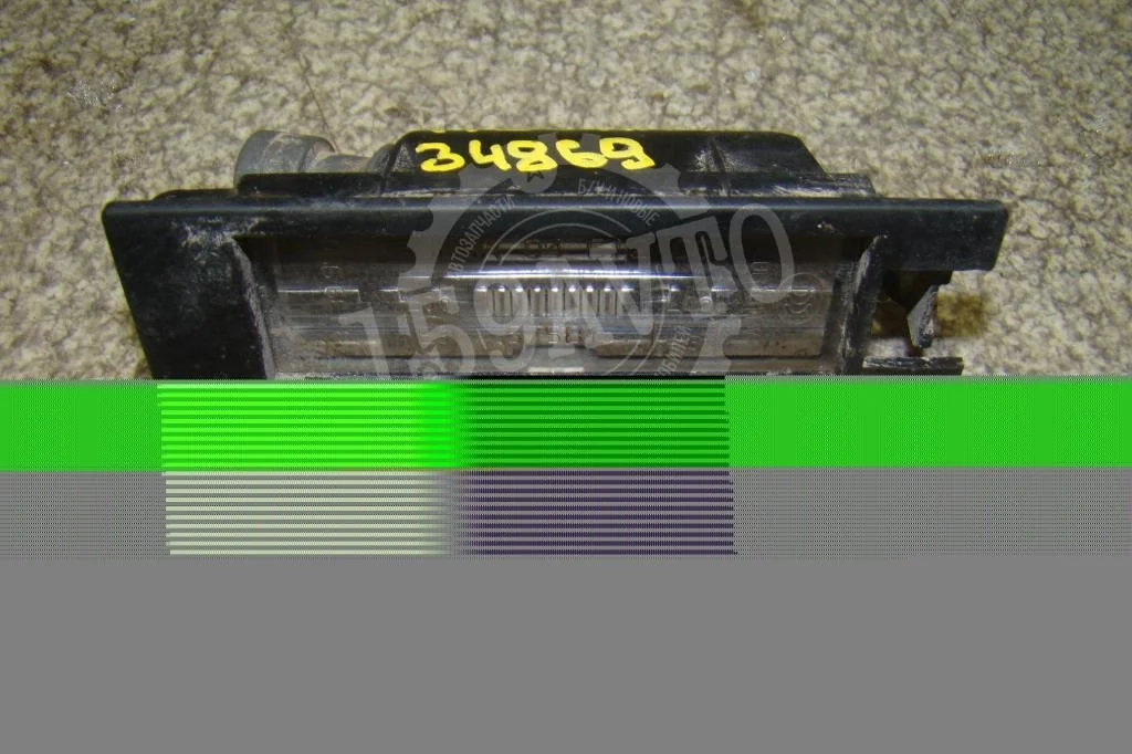 Фонарь подсветки номера Opel Astra 2007 H