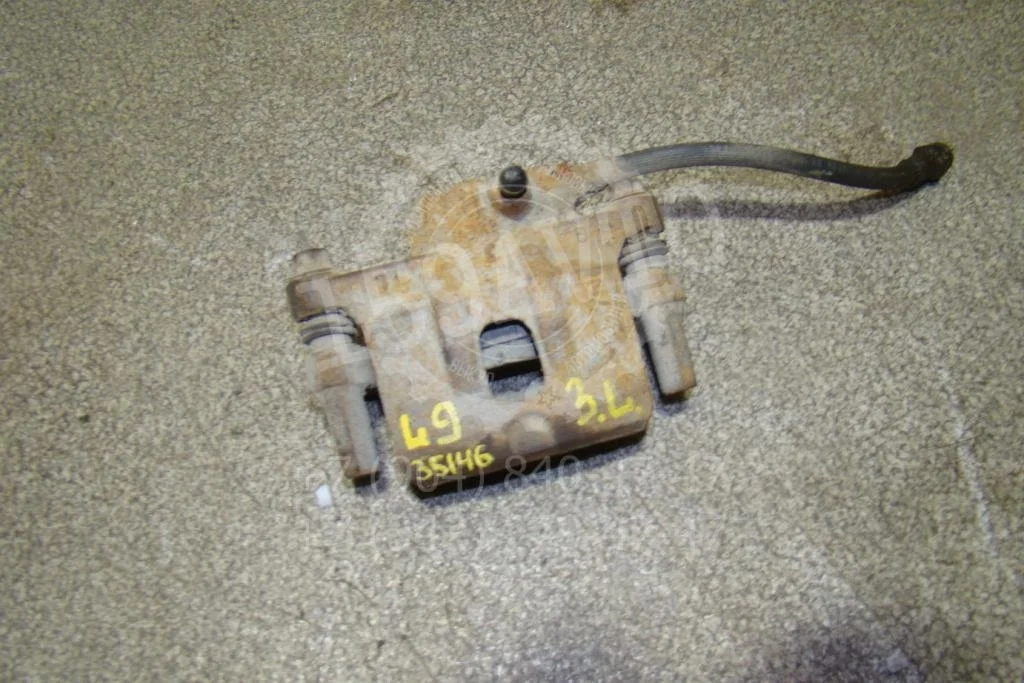 Суппорт задний правый Mitsubishi Lancer 9 CS