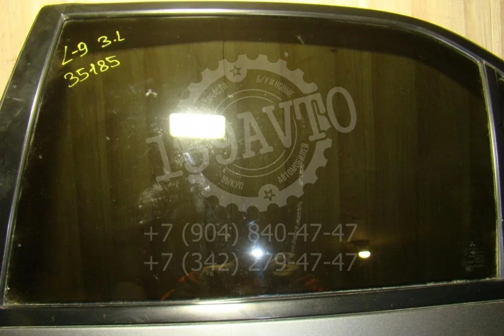 Стекло двери задней левой Mitsubishi Lancer 9 CS