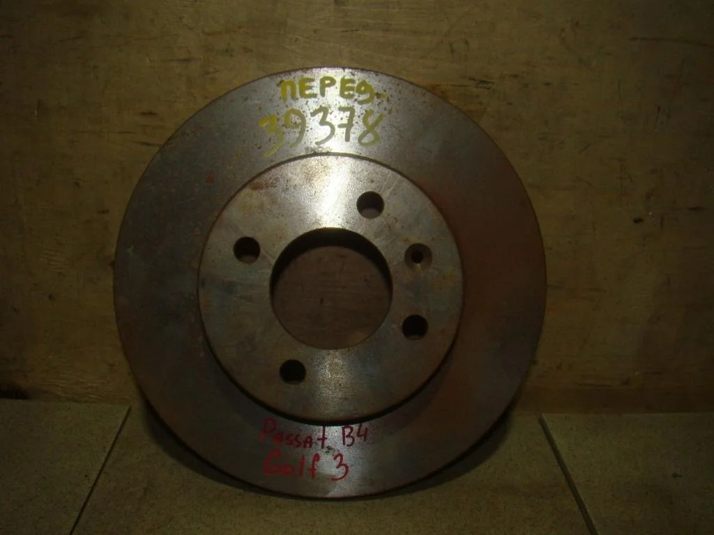 Диск тормозной передний не вентилируемый Volkswagen Passat B4