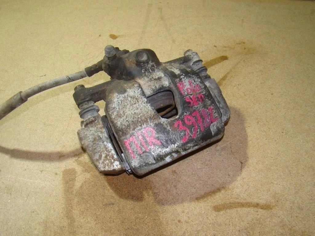 Суппорт передний правый Volkswagen Polo 5