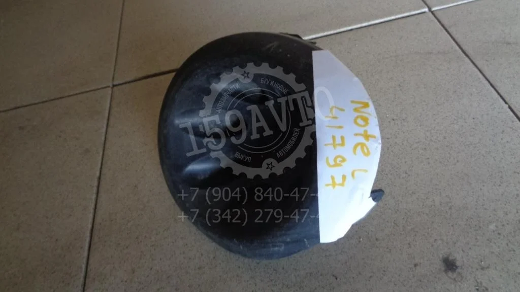 Заглушка в бампер левая Nissan Note E11