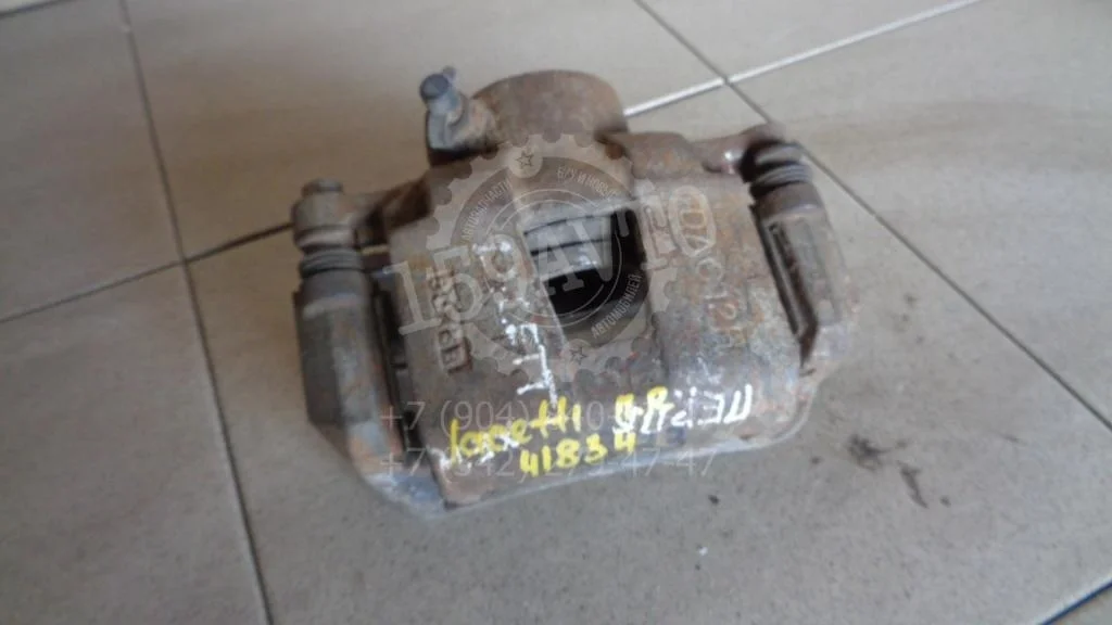 Суппорт передний правый Chevrolet Lacetti J200