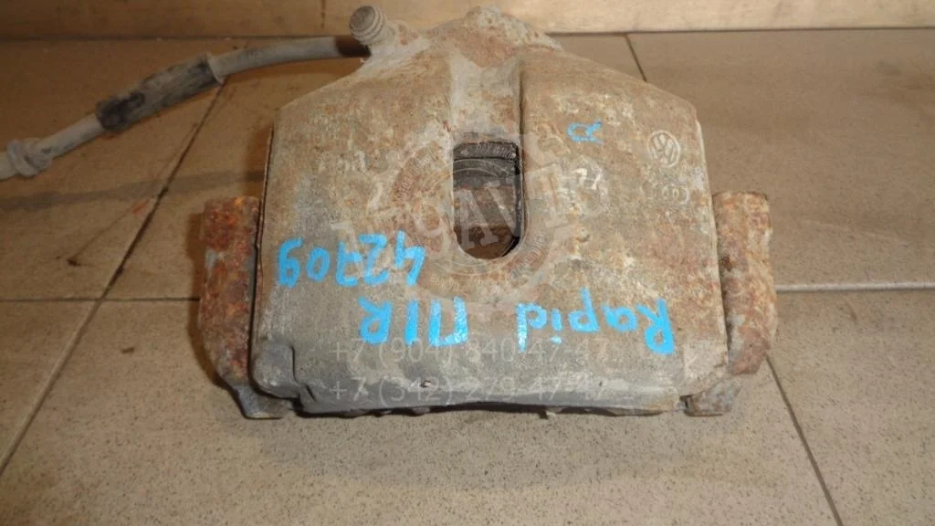 Суппорт передний правый Skoda Rapid 1 2014