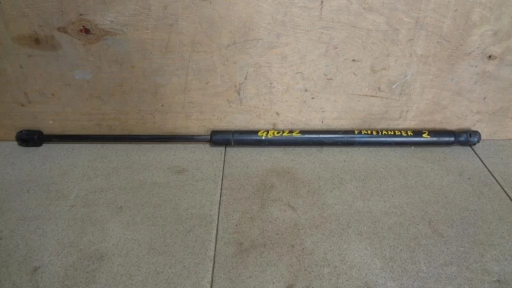 Амортизатор двери багажника Land Rover Freelander 2 L359