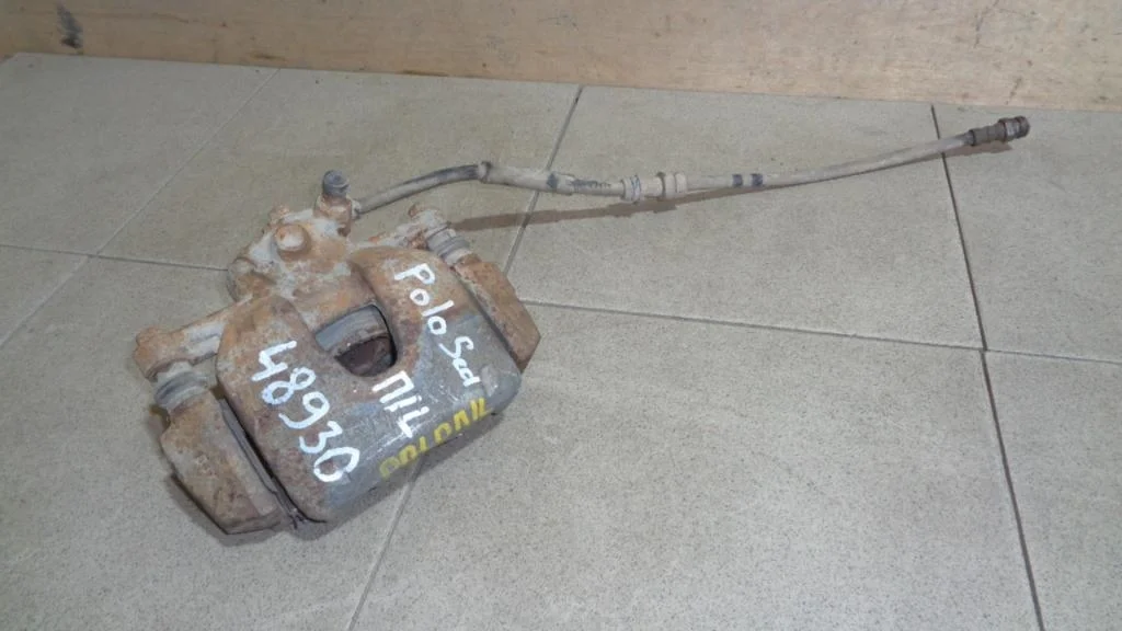 Суппорт передний левый Volkswagen Polo 5