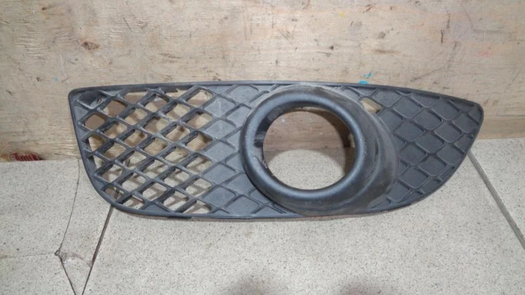 Решетка в бампер левая Mitsubishi Lancer 10 CY