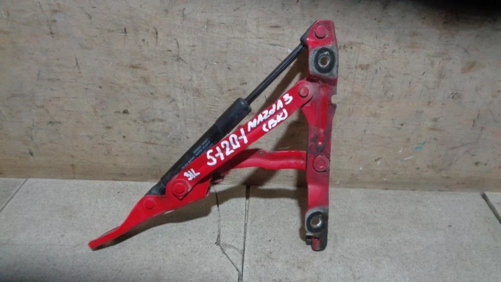 Петля крышки багажника Mazda 3 BK