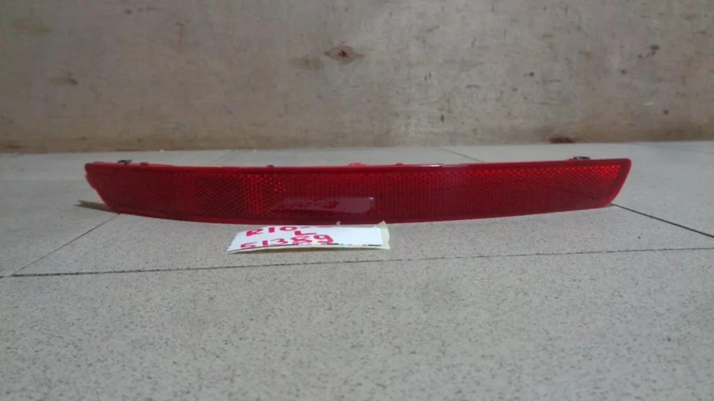 Отражатель в бампер задний левый Kia RIO 3 UB, QB