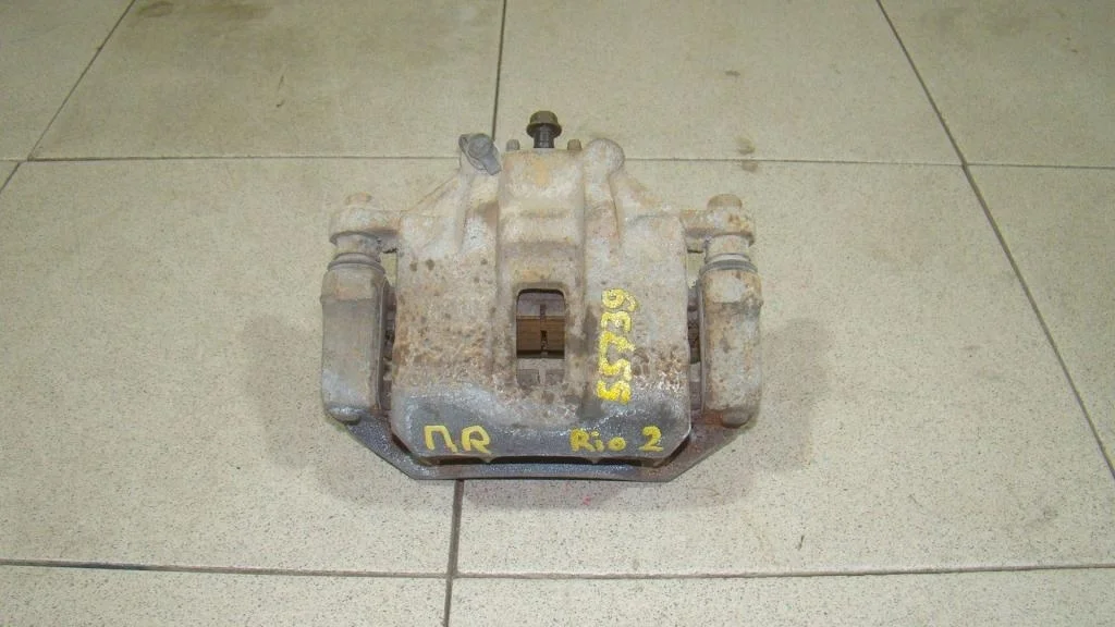 Суппорт передний правый Kia RIO 2 JB