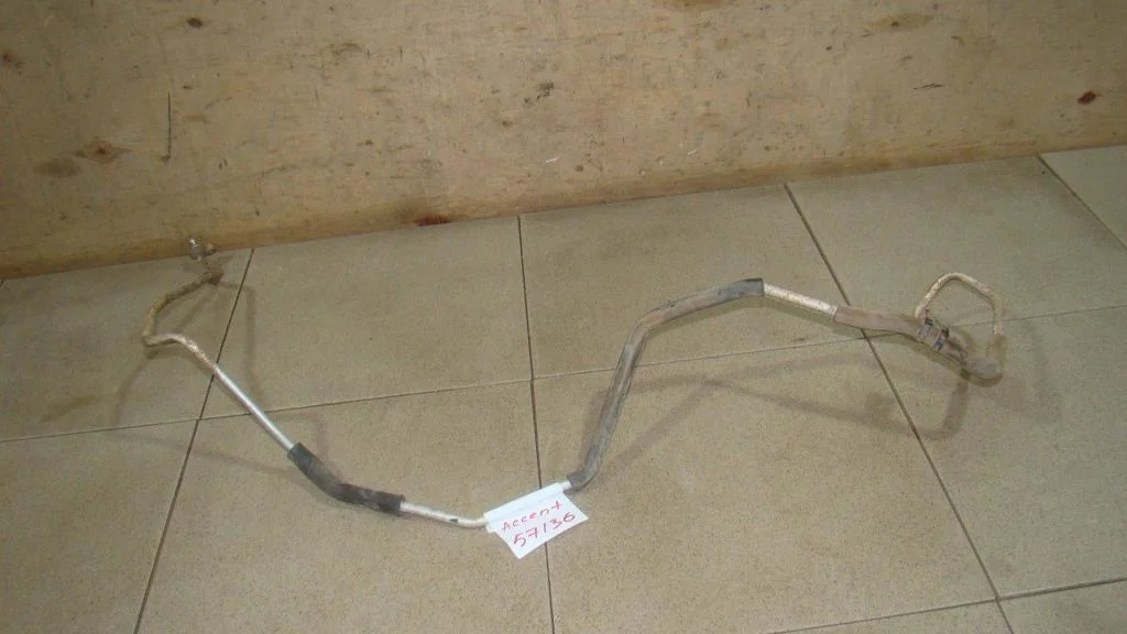 Трубка кондиционера Hyundai Accent LC