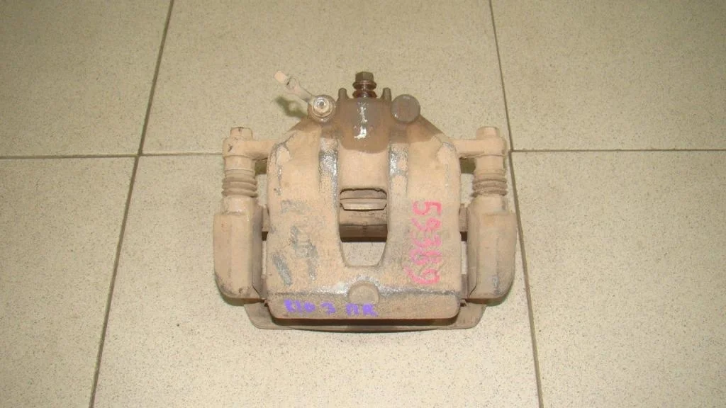 Суппорт передний правый Kia RIO 3 UB, QB