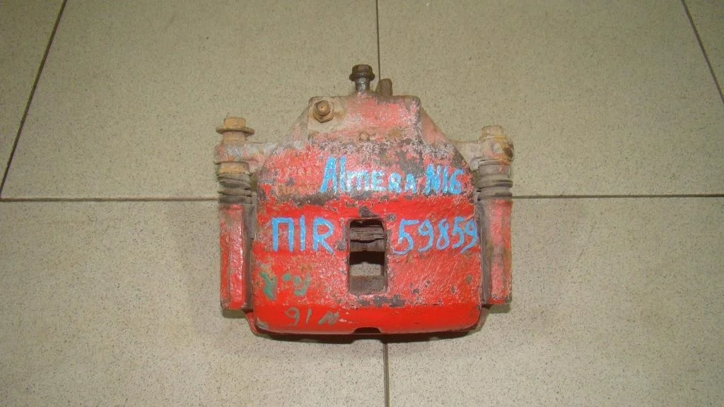 Суппорт передний правый Nissan Almera 2000 N16