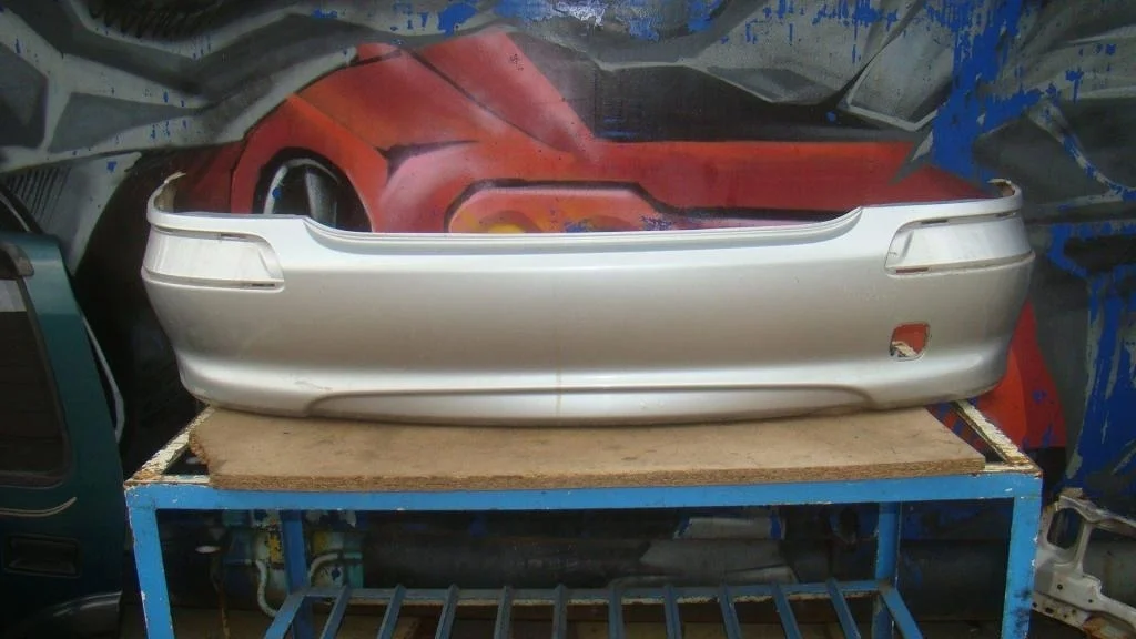 Бампер задний Nissan Almera 2000 N16