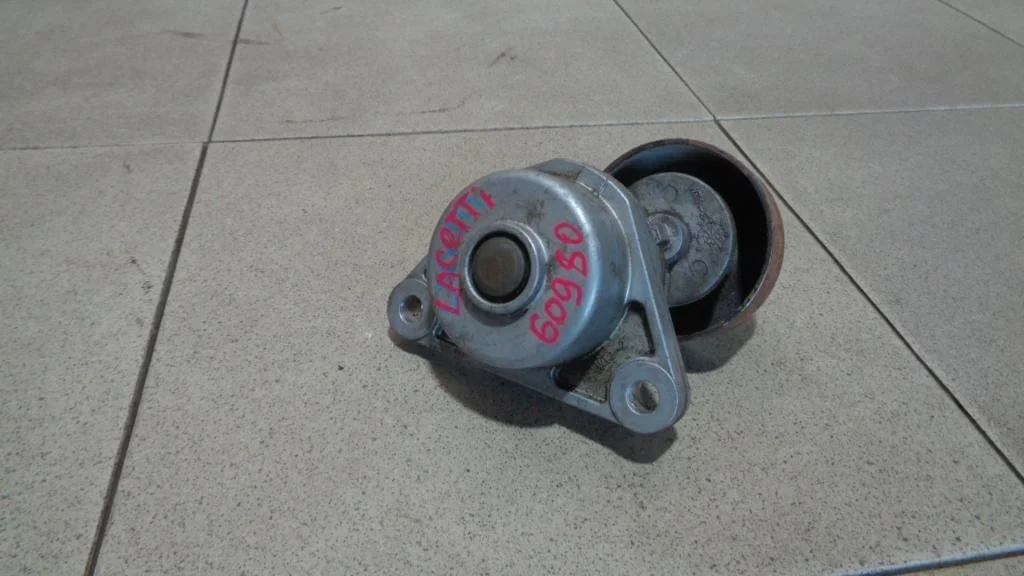 Ролик-натяжитель ремня грм Chevrolet Lacetti J200