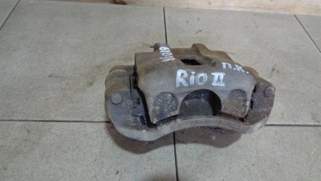 Суппорт передний правый Kia RIO 2 2010 JB