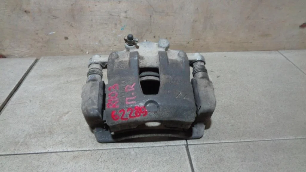 Суппорт передний правый Kia RIO 3 UB, QB