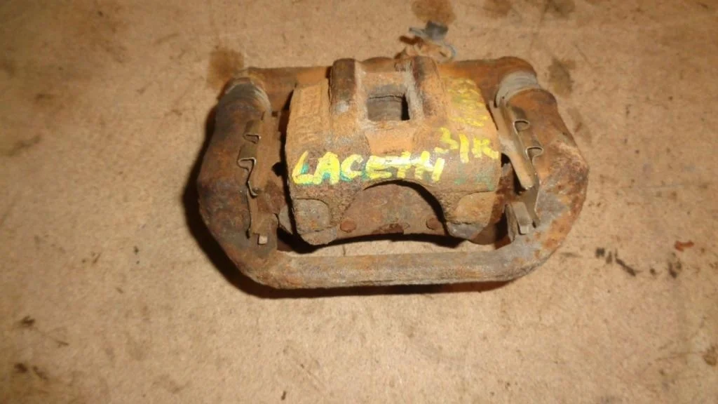 Суппорт задний правый Chevrolet Lacetti J200