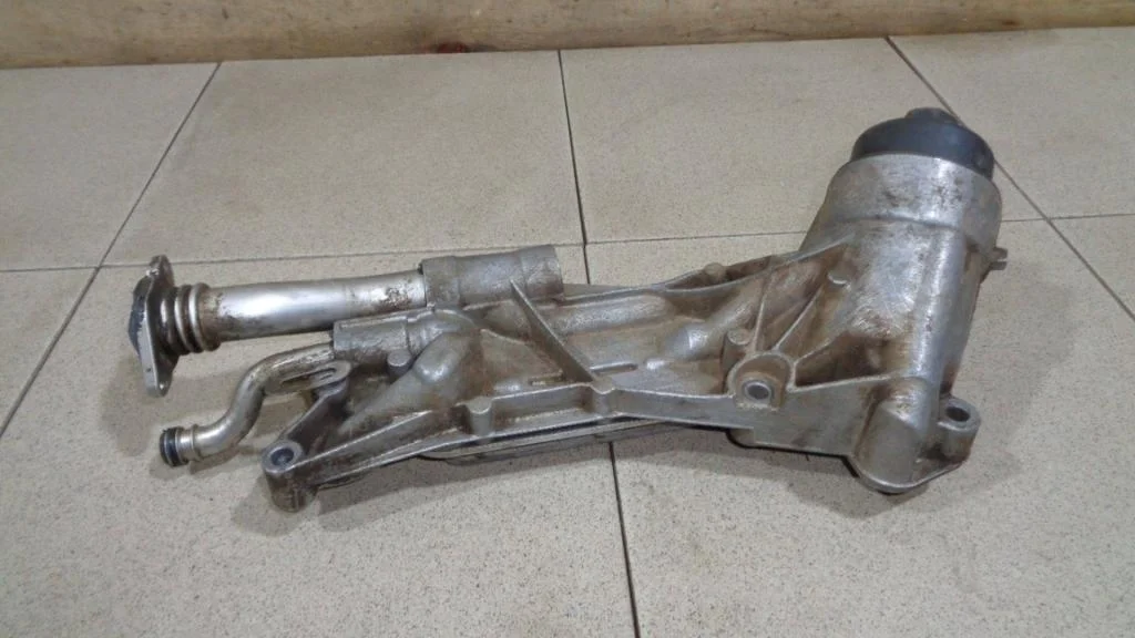 Корпус масляного фильтра Chevrolet Aveo T250, T255