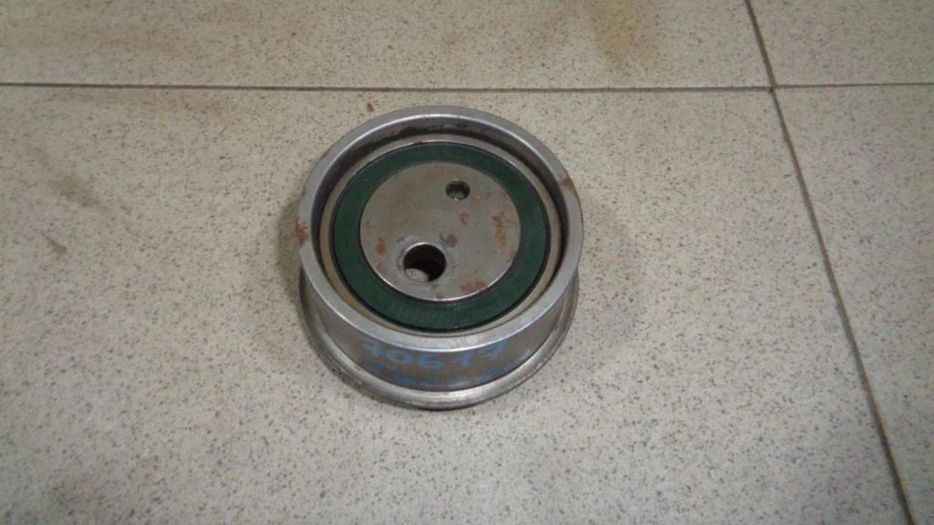 Ролик-натяжитель ремня грм Hyundai Tucson 1 JM