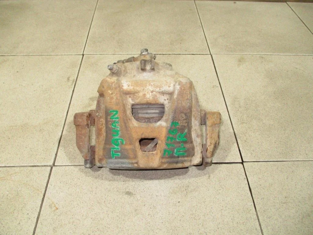 Суппорт передний правый Volkswagen Tiguan 1 NF