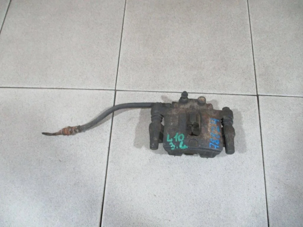 Суппорт задний левый Mitsubishi Lancer 10 CY