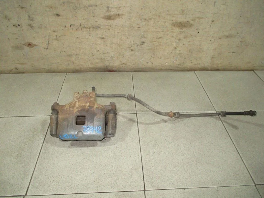 Суппорт передний левый Mitsubishi Lancer 10 CY