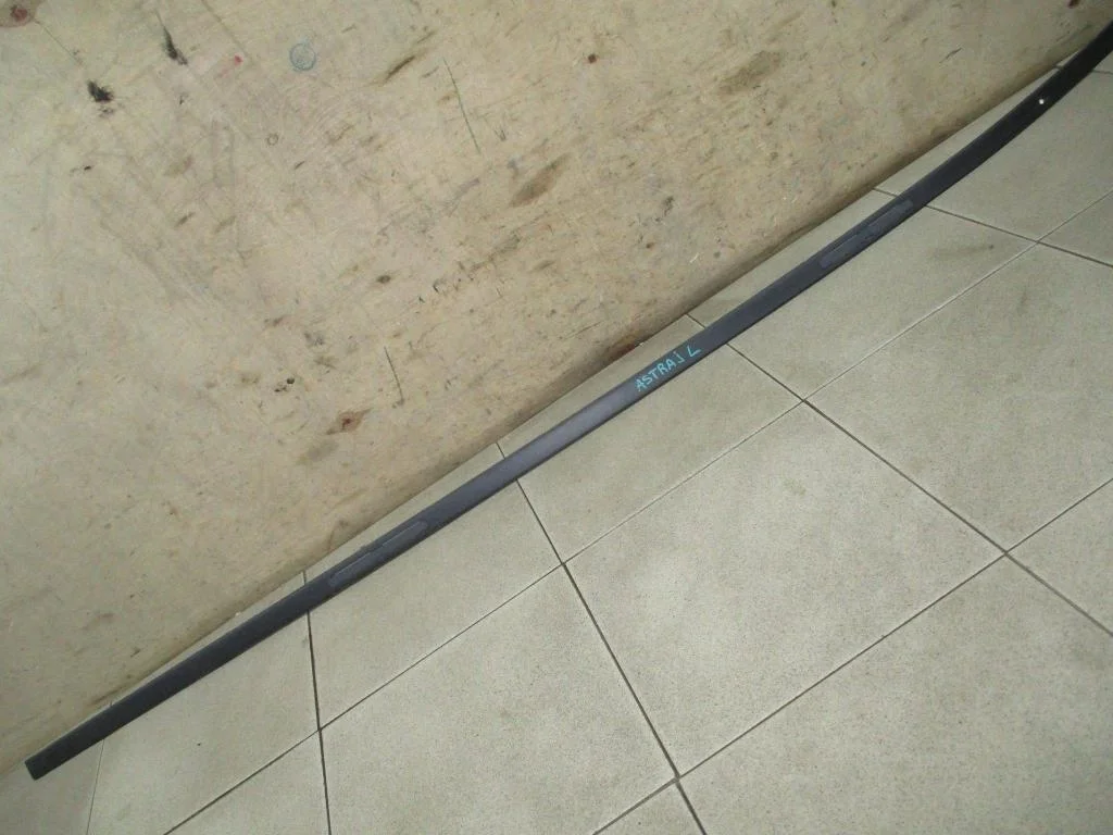 Молдинг крыши левый Opel Astra J