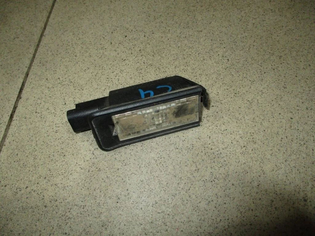 Фонарь подсветки номера Citroen C4 2013 B7