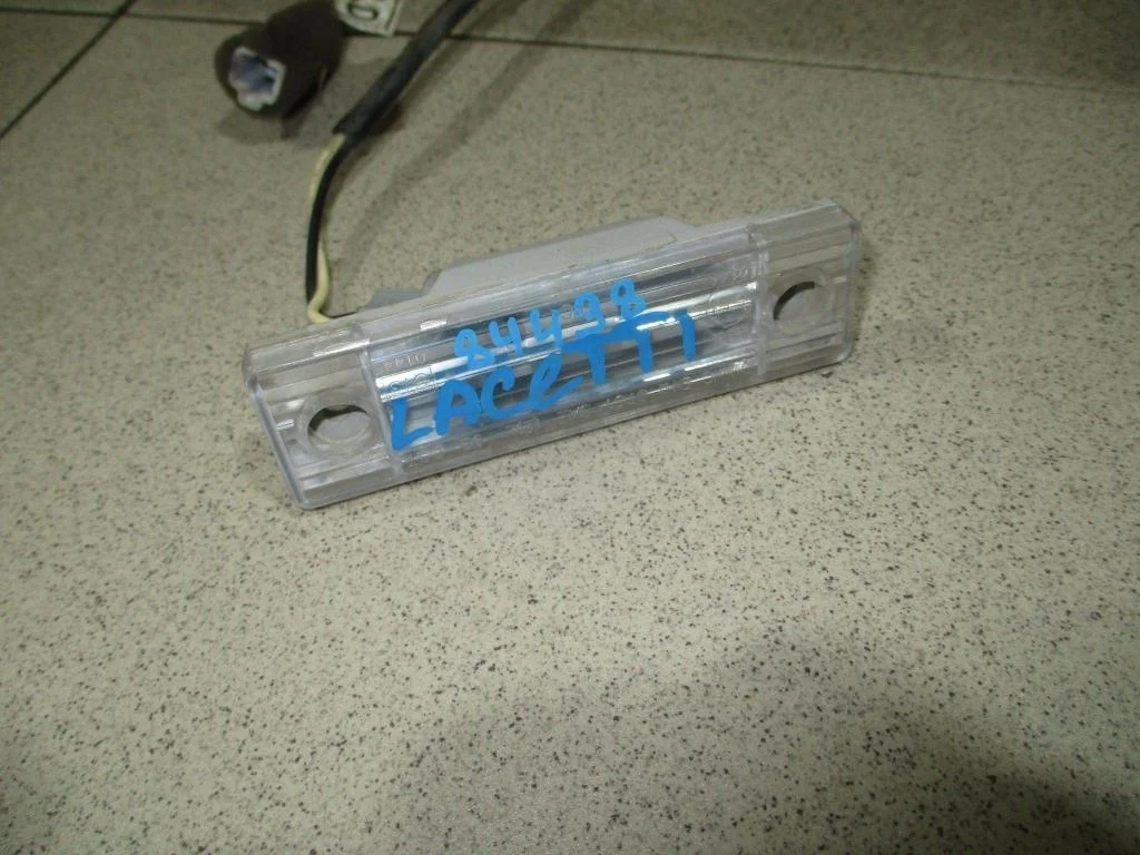 Фонарь подсветки номера Chevrolet Lacetti J200