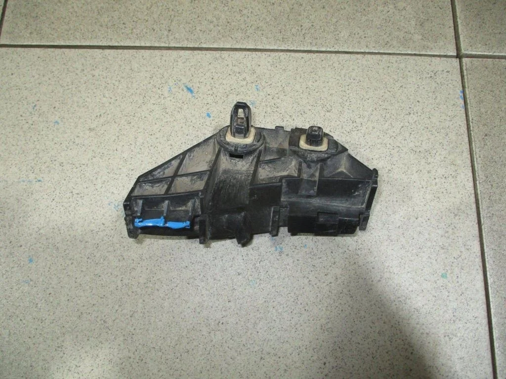 Кронштейн заднего бампера левый Toyota Corolla E150