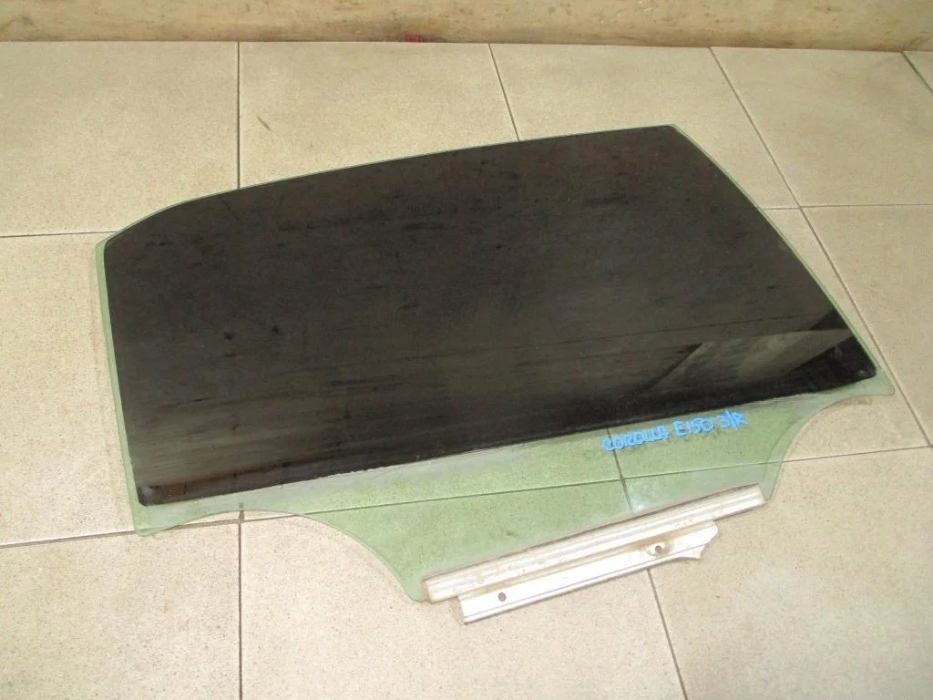 Стекло двери задней правой Toyota Corolla E150