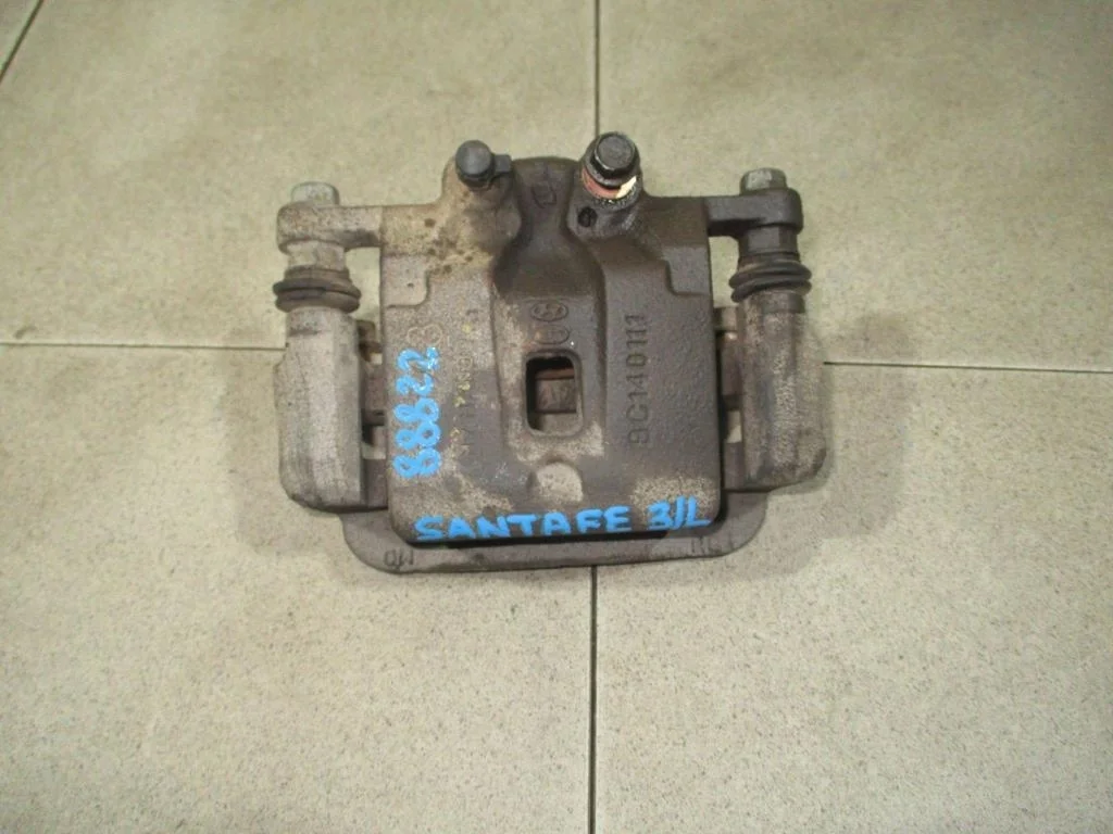 Суппорт задний левый Hyundai Santa Fe 2 2011 CM