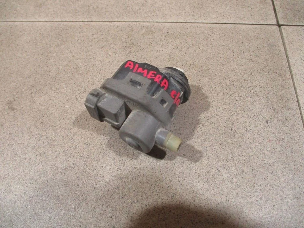 Моторчик корректора фары Nissan Almera Classic B10