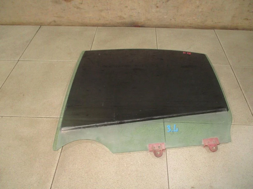 Стекло двери задней левой Nissan Almera N16