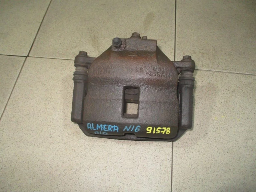 Суппорт передний правый Nissan Almera 2005 N16